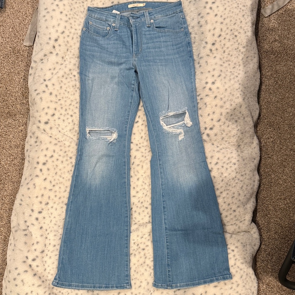 Women's Light Blue Distressed Flare Jeans